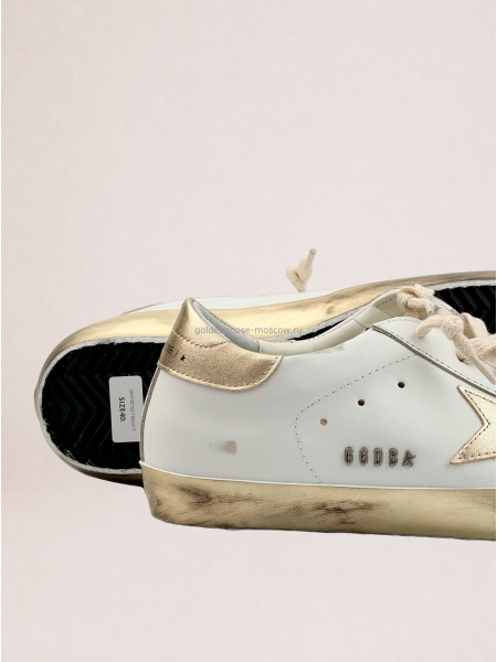 Golden Goose Super-Star with gold sparkle foxing and metal stud lettering Golden Goose Super-Star with gold sparkle foxing and metal stud lettering