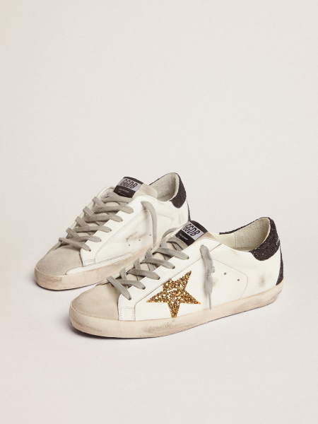 Golden Goose Super-Star In Gold Glitter Star And Black Glitter Heel tab Golden Goose Super-Star In Gold Glitter Star And Black Glitter Heel tab